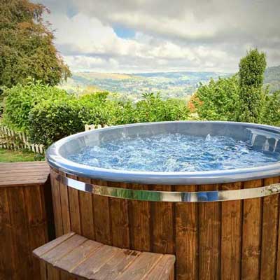 An image of the hot tub at Burlrigh Court Holiday Cottage