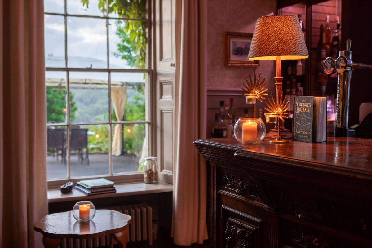 Lounge and bar _ bar with views _ Burleigh Court Cotswolds Hotel _ Restaurant