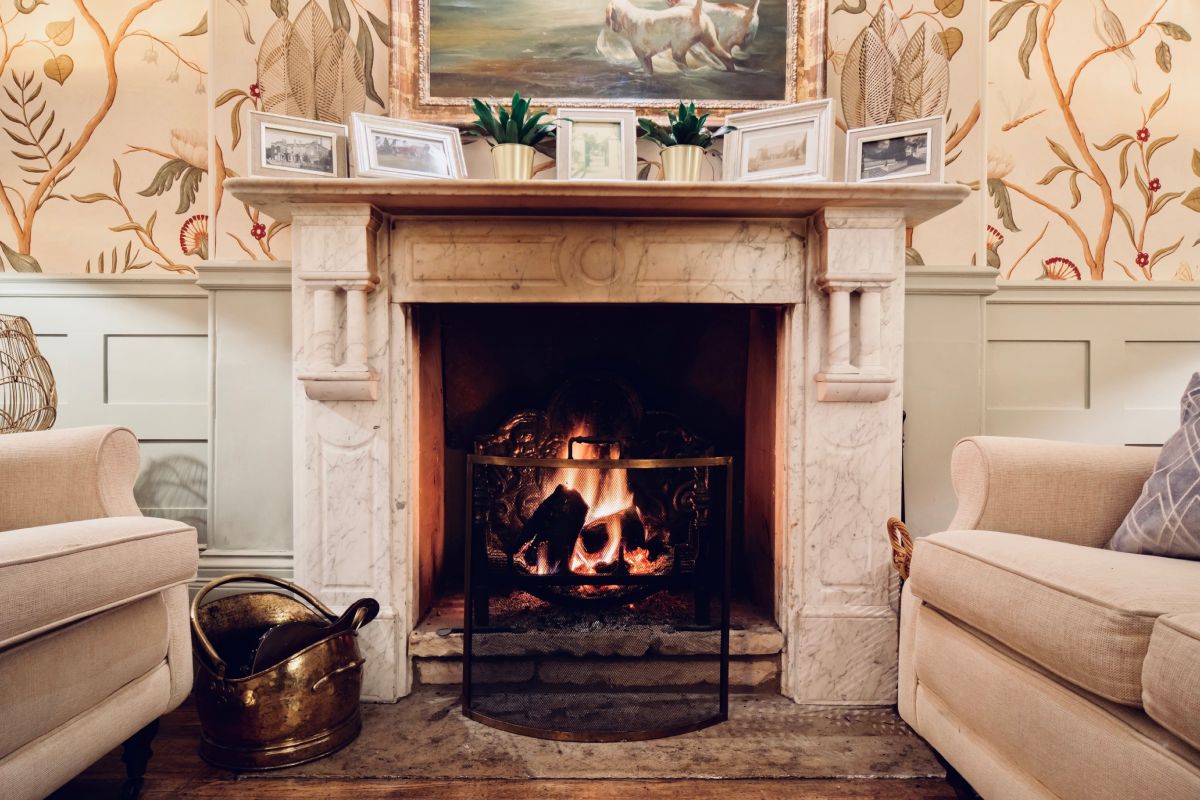 Lounge and bar _ open fireplace _ Burleigh Court Cotswolds Hotel _ Restaurant