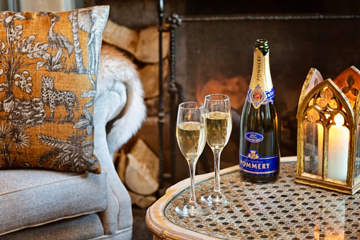 burleigh court cotswolds relaxing bar with champagne