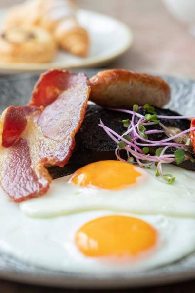 Full English breakfast served at The Burleigh Court Cotswolds Hotel.